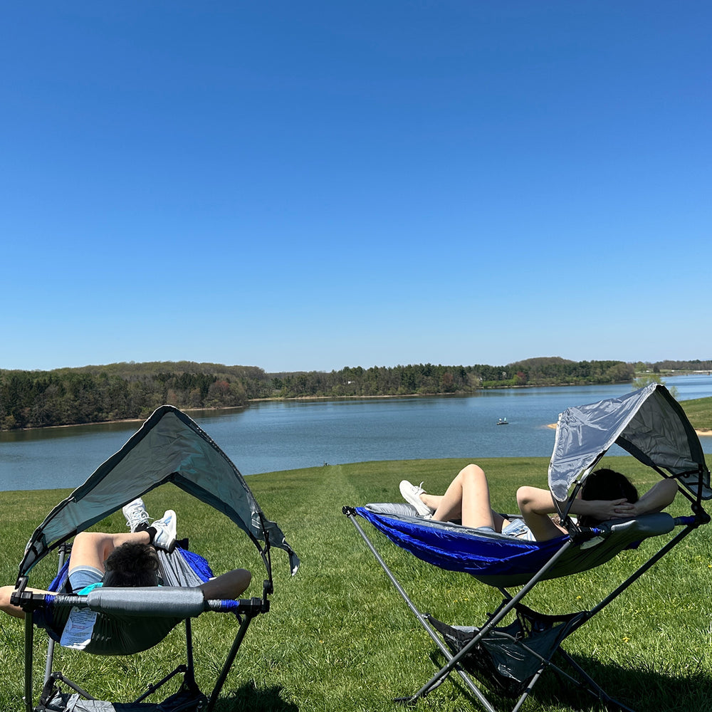 camping portable hammock with stand by the lake